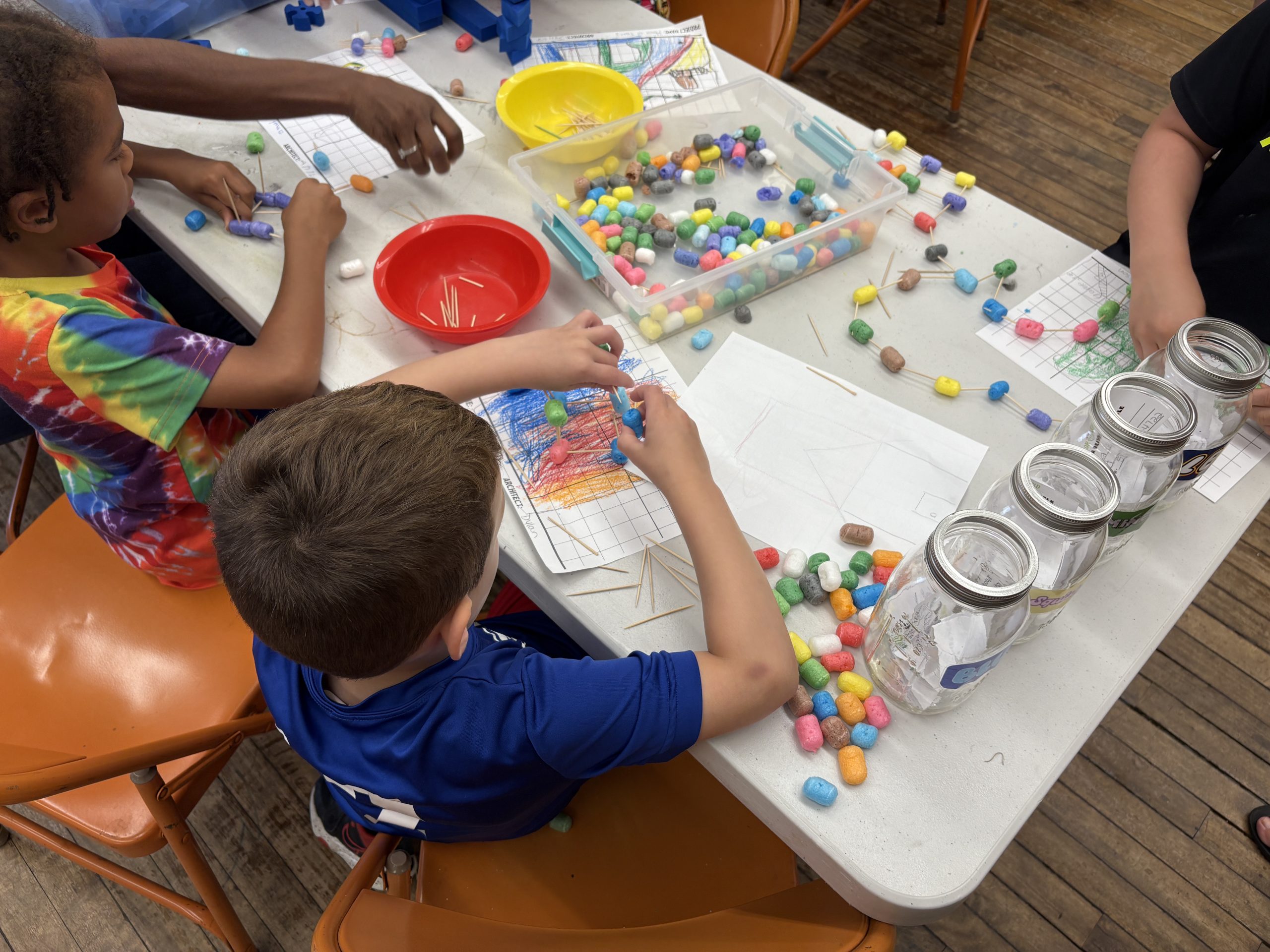 Kids show their projects off at a program